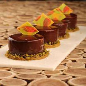 Pistachio creme Brulee with Dark Chocolate mousse & almond Dacquoise