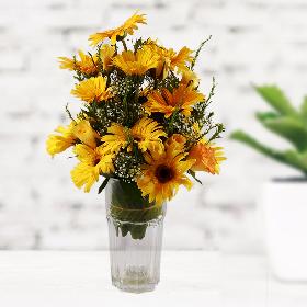 Vase with yellow flowers