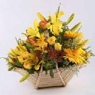 basket of yellow  coloured different  flowers 