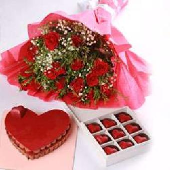 Chocolate torte 500gms anniversary birthday cake with Red roses hand bouquet box of 9 rasberry pralines late night home delivery